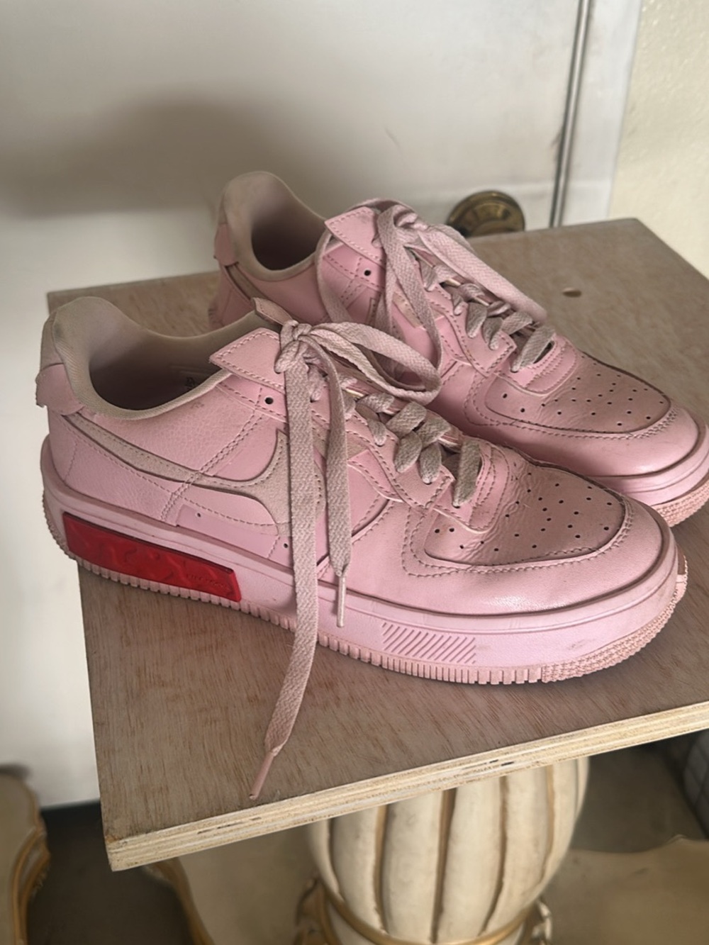 Nike Women Pink Leather Low-Top Sneakers with Red Accent
